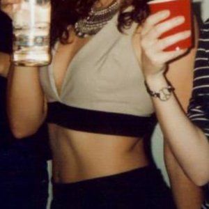 Solemio beige and black crop top with button, S